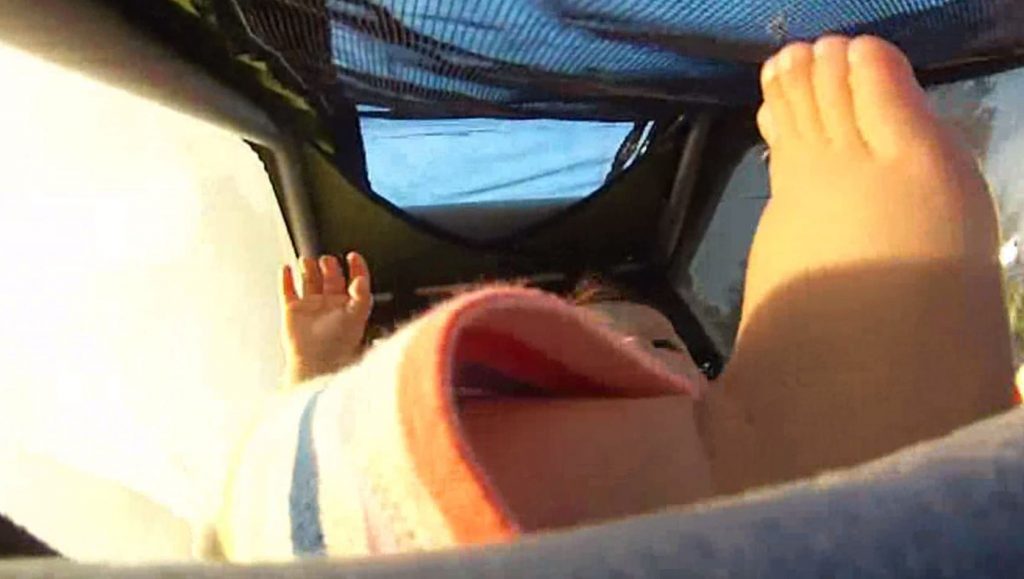 Baby foot in a bike trailer