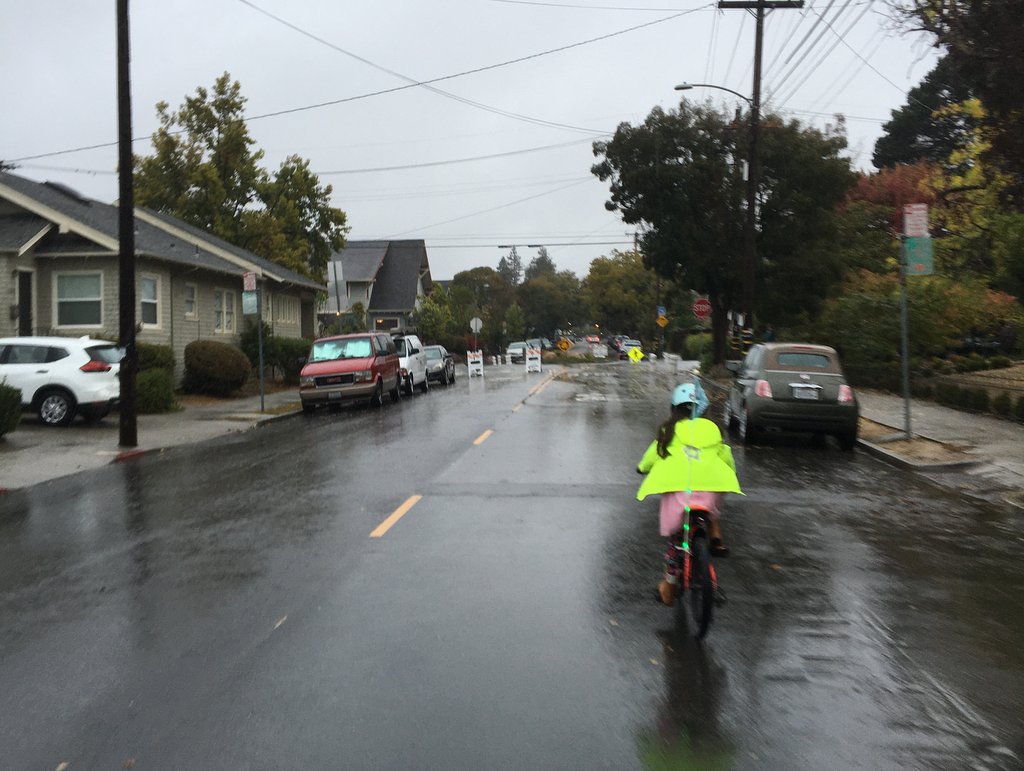 Bike riding with the kid in the rain