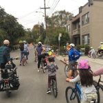 Children riding their bikes to school