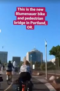 Riding a bike across the new Blumenauer Bridge in Portland, OR