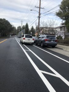 An SUV parked in a bicycle lane in Oakland, CA
