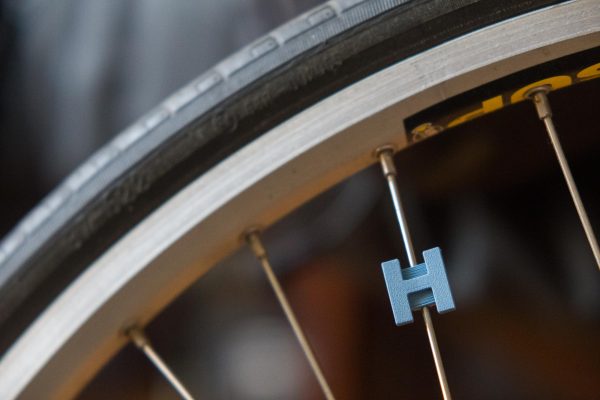 Letter H spoke decoration for bicycle wheels