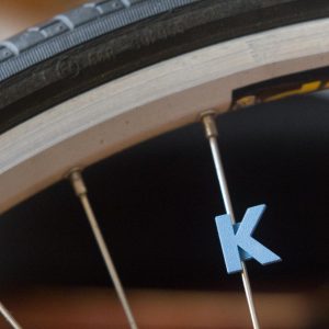 Bike wheel spoke decoration accessory in the shape of the letter K