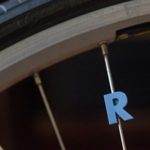 Letter R spoke decoration accessory for bicycle wheels