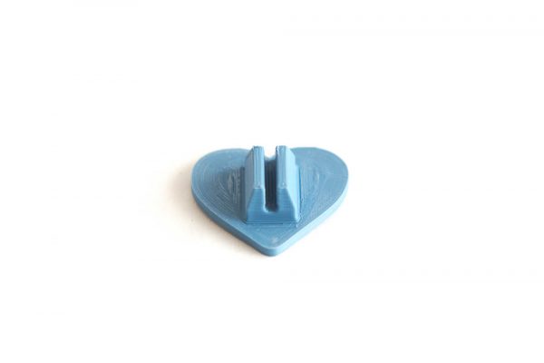 Heart spoke decoration for bicycle wheel spokes. Blue color, plant based plastic. Accessory clips on bike spokes. Made in USA