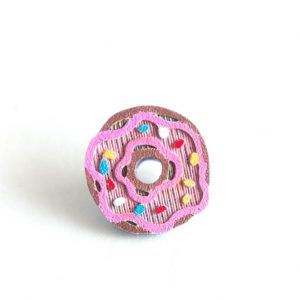 Pink donut with sprinkles hand painted bike spoke decoration