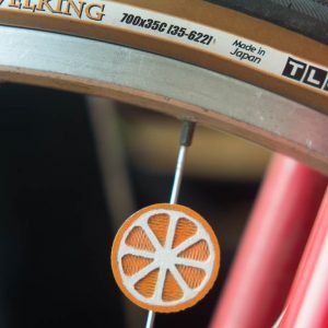 Orange citrus slice spoke decoration for bike wheels