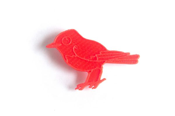 red bird spoke card decoration for a bicycle wheel