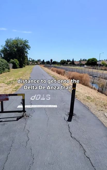 Delta De Anza Trail - paved, brown grass, blue skies